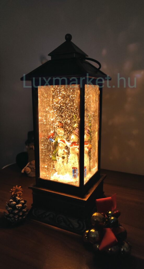 Karácsonyi világító zenélő hóesést imitáló LED lámpás 28 cm hóemberek motívummal