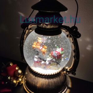 Karácsonyi LED lámpás zenél világít hóesést imitál 21 cm mikulás rénszarvas motívummal