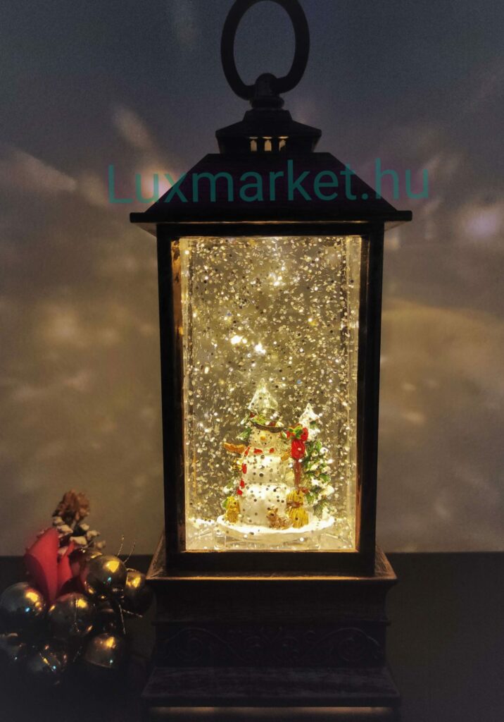 Karácsonyi LED lámpás zenél világít hóesést imitál 23 cm hóember motívummal